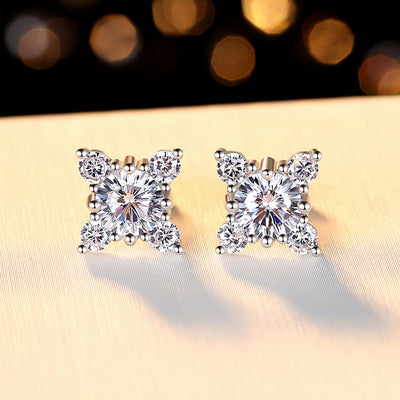 Beautifully crafted silver earrings with 0.8 CT moissanite diamond and flush accent stones