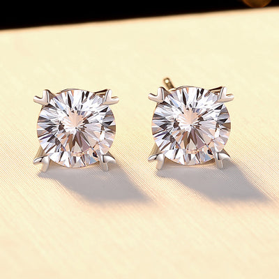 Get dazzled by our handmade romantic stud earrings featuring 1 CT round shape moissanite lab created diamond set in 925 sterling silver plated with white gold. Perfect gift for someone special!